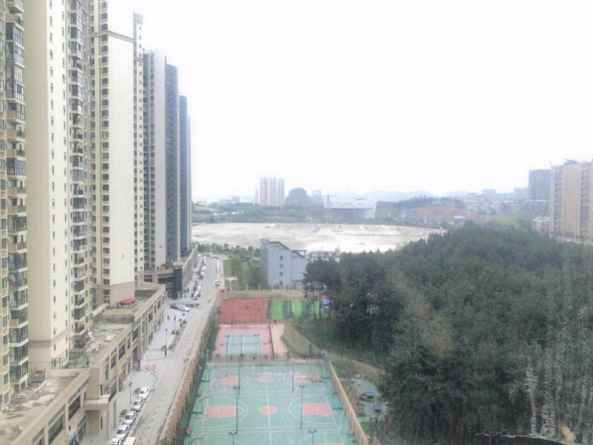 Iu Hotel Guiyang Olympic Sports Center China Resources Vientiane מראה חיצוני תמונה