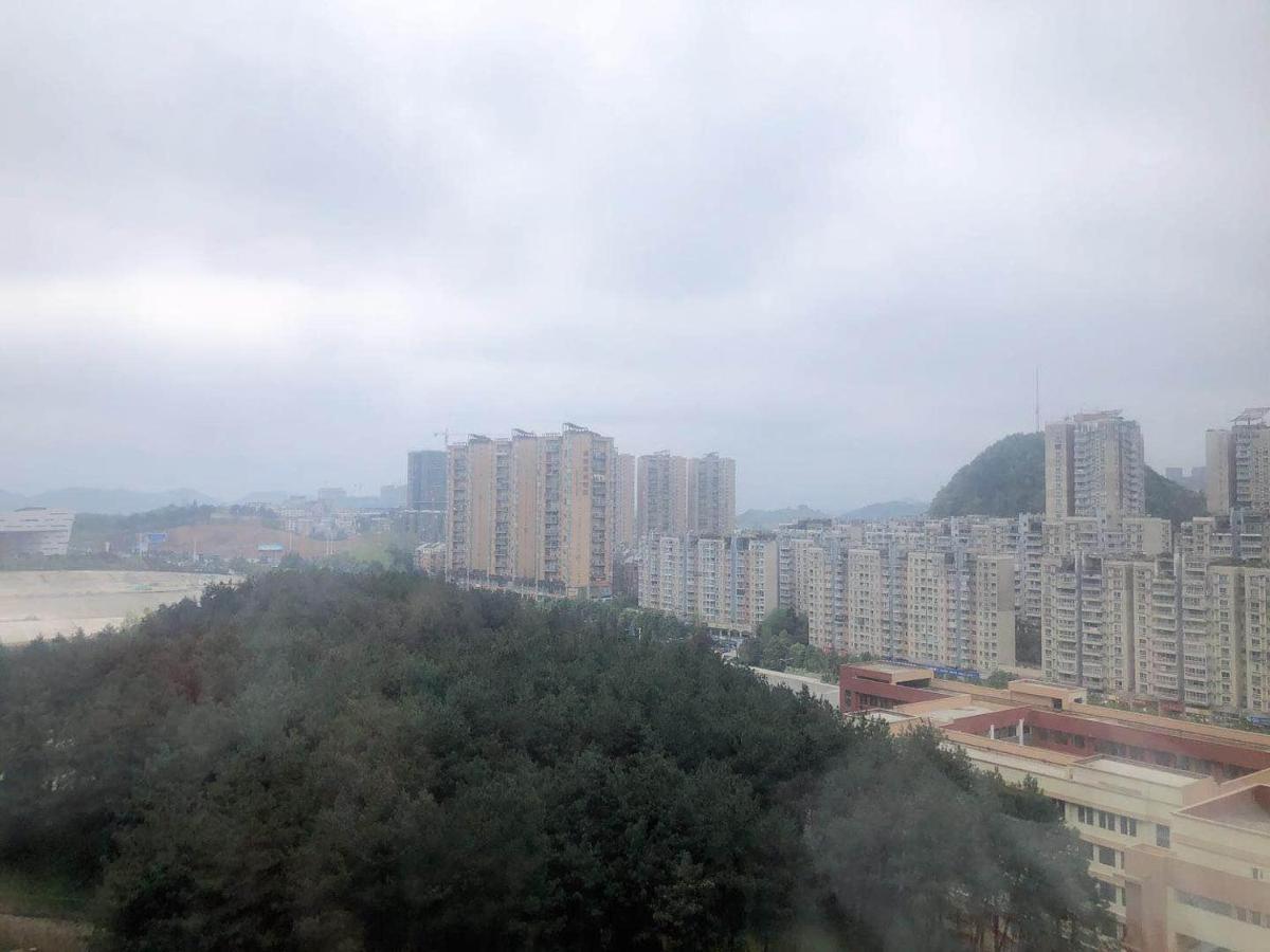 Iu Hotel Guiyang Olympic Sports Center China Resources Vientiane מראה חיצוני תמונה